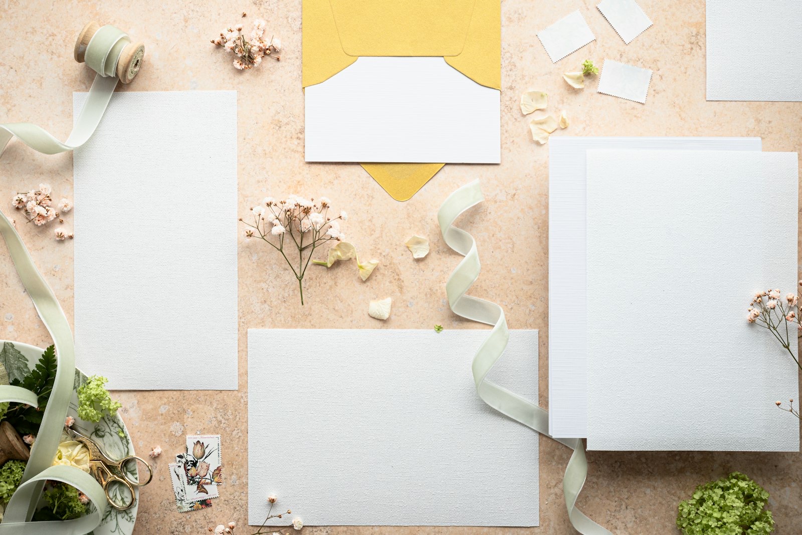 Wedding stationery arranged on a table